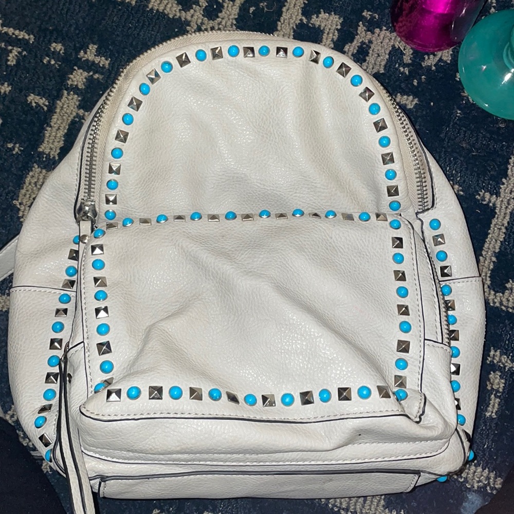 Gray studded backpack